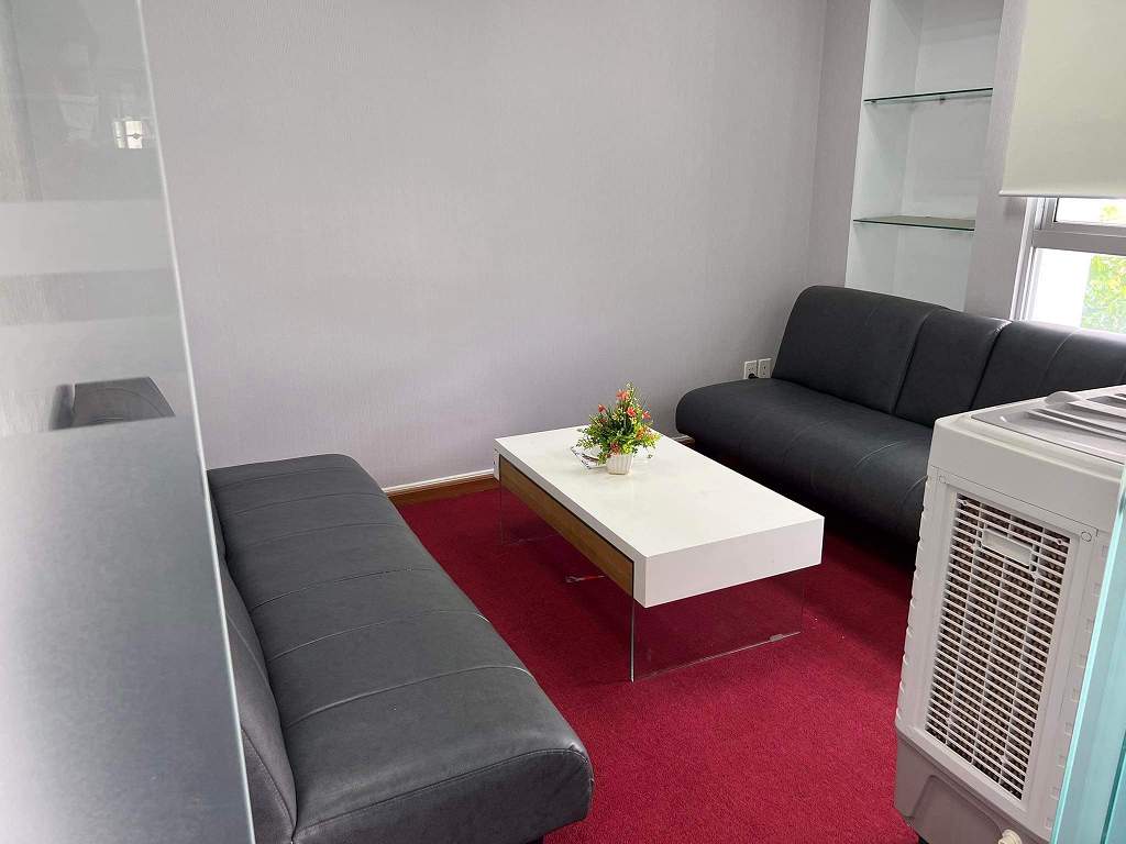 Guest lounge with sofas and a coffee table
